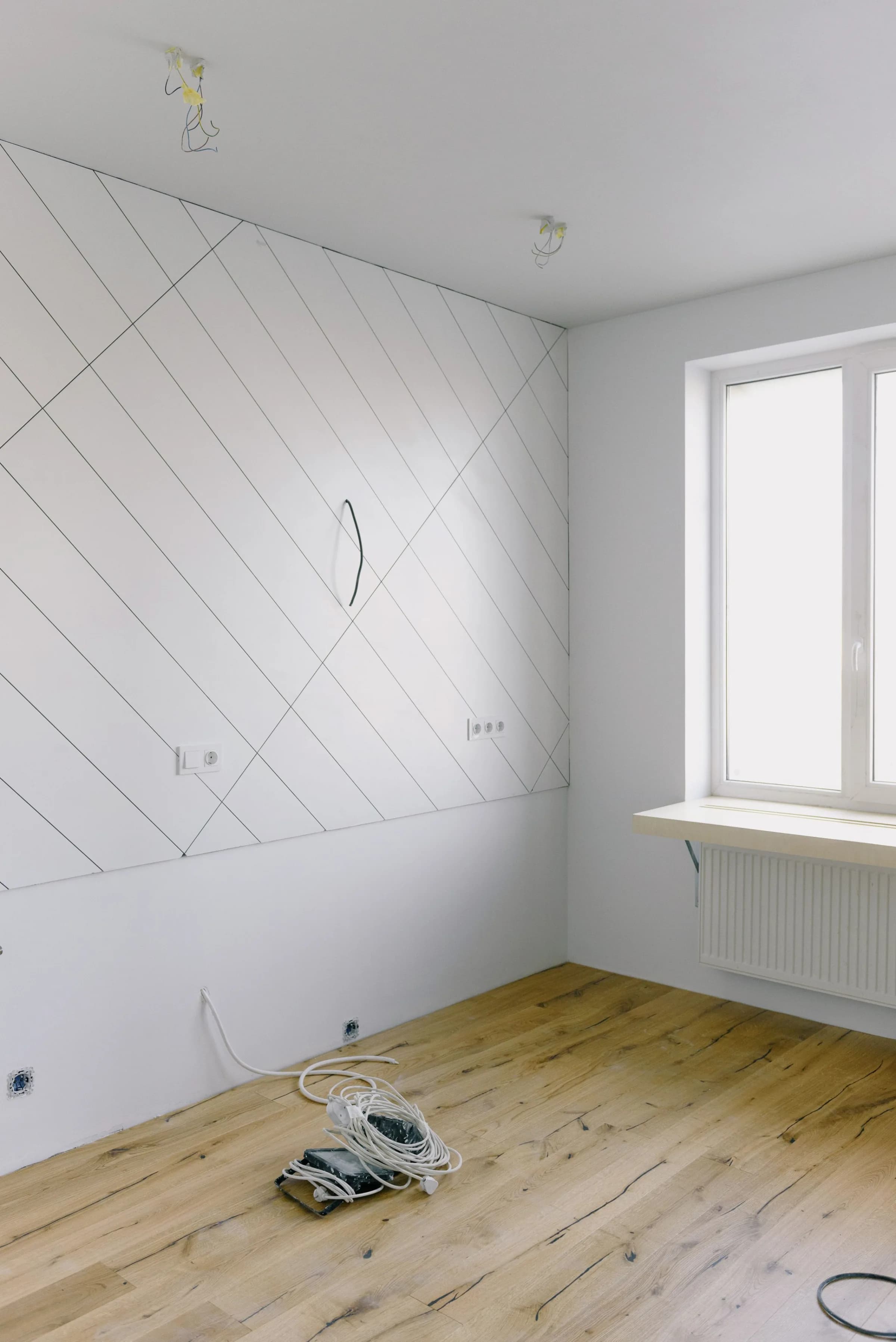 Residential room prepared for electrical work during a renovation